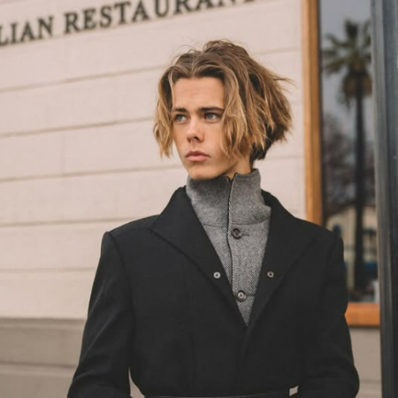 Aiden Ricklef gained popularity with his tongue-in-cheek TikTok shorts made up of lip-syncs, funny memes, and style-modeling photographs. 